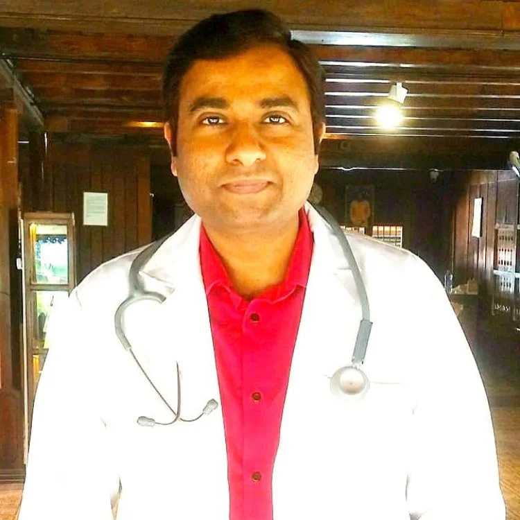 Dr.T.Godwin shathayu